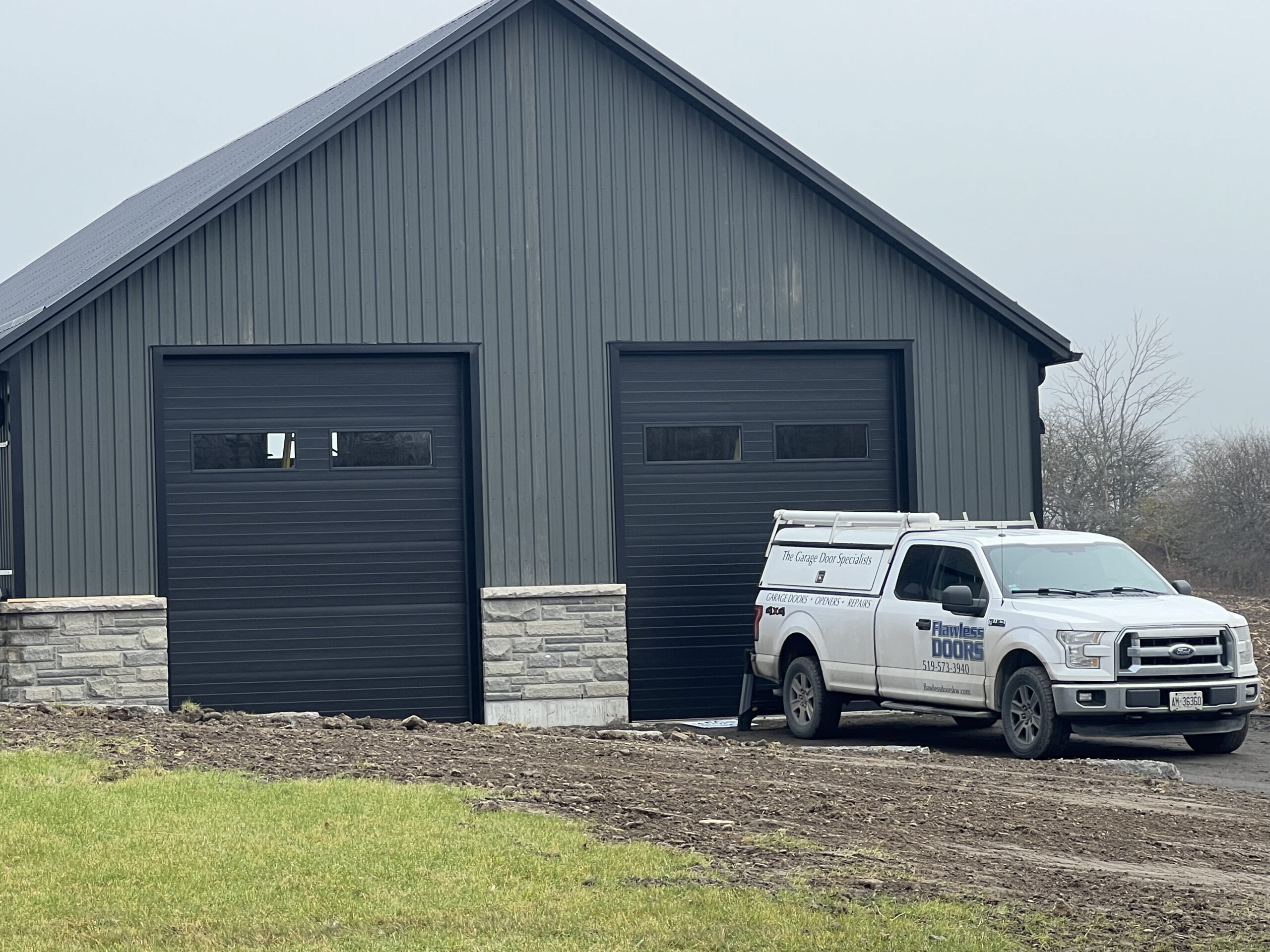 Garage door installation on a rural property near Cambridge Ontario