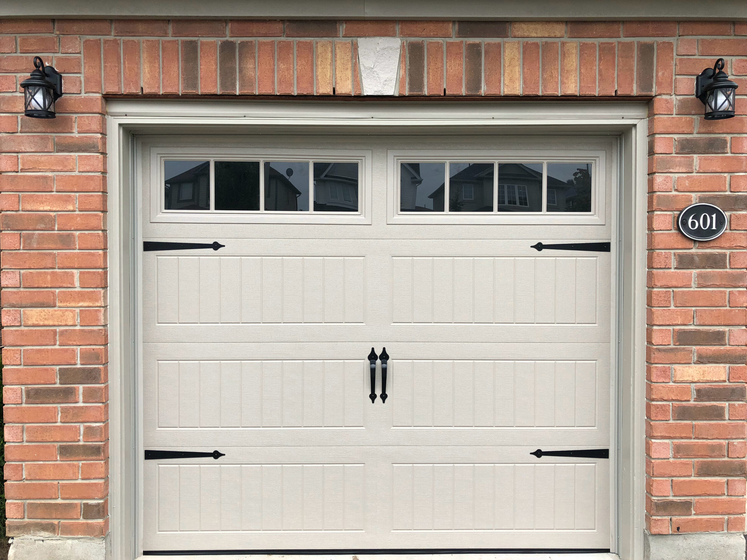 Garage door maintenance by Flawless Doors in Kitchener Ontario.